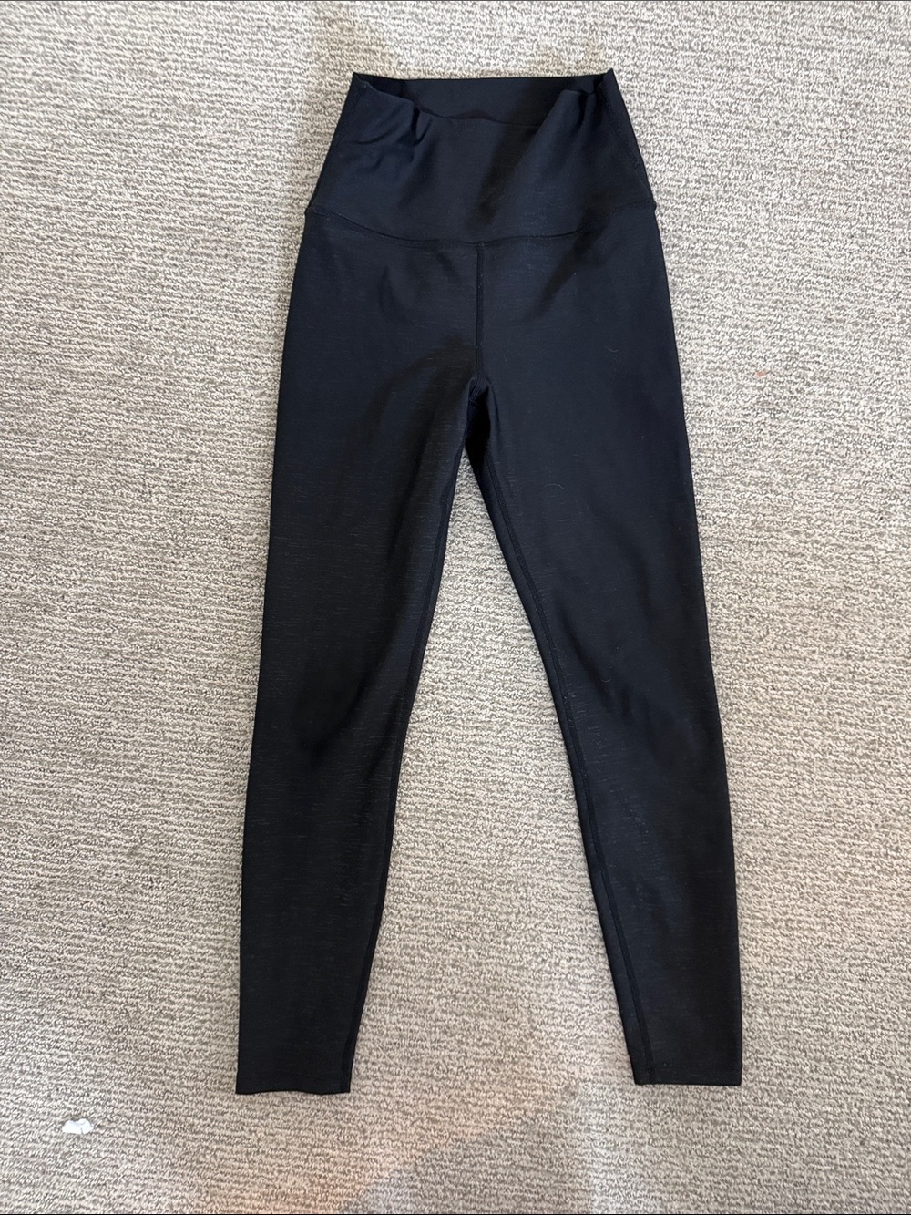 High-Rise Black Carbon38 Leggings with silver threading.